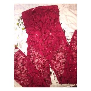 prettylittlething flashy red sequin jumpsuit.